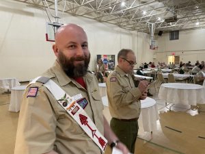 Kyle Hughes and Grover McDaniel tabulate votes at the 2023 Lodge Winter Banquet business meeting